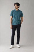GR Apparel Piqué Polo in teal — front