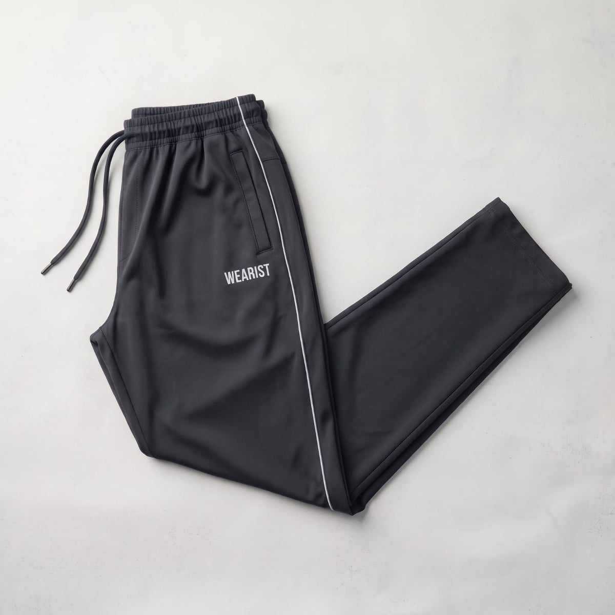 GR Apparel Piped Track Pants in charcoal — front