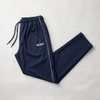 GR Apparel Piped Track Pants in navy — front