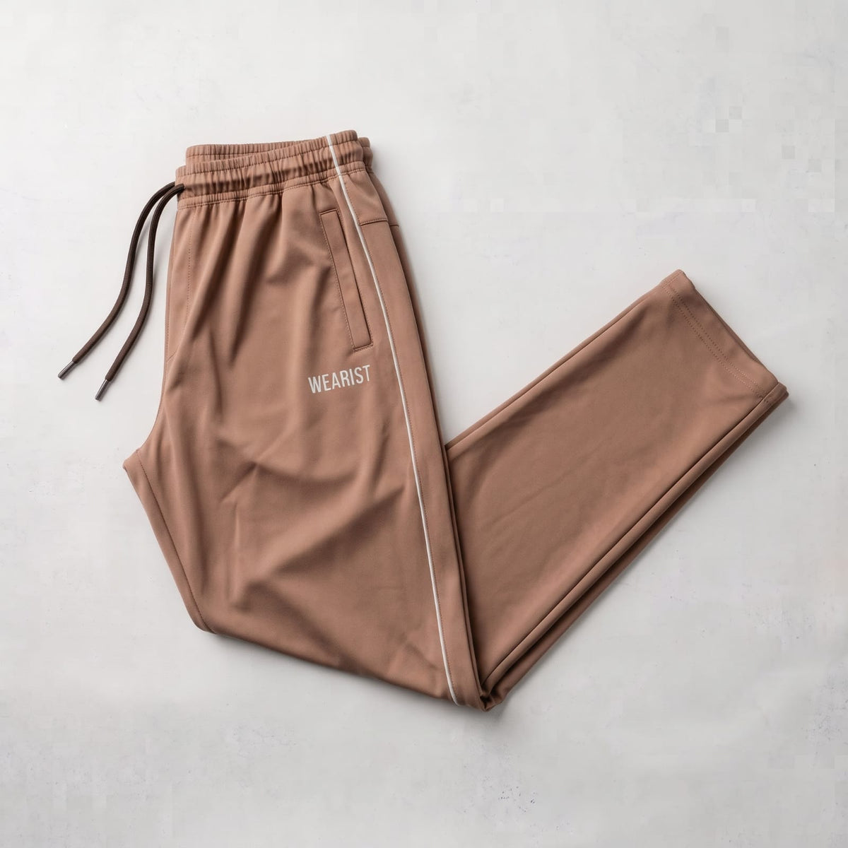 GR Apparel Piped Track Pants in mocha — front